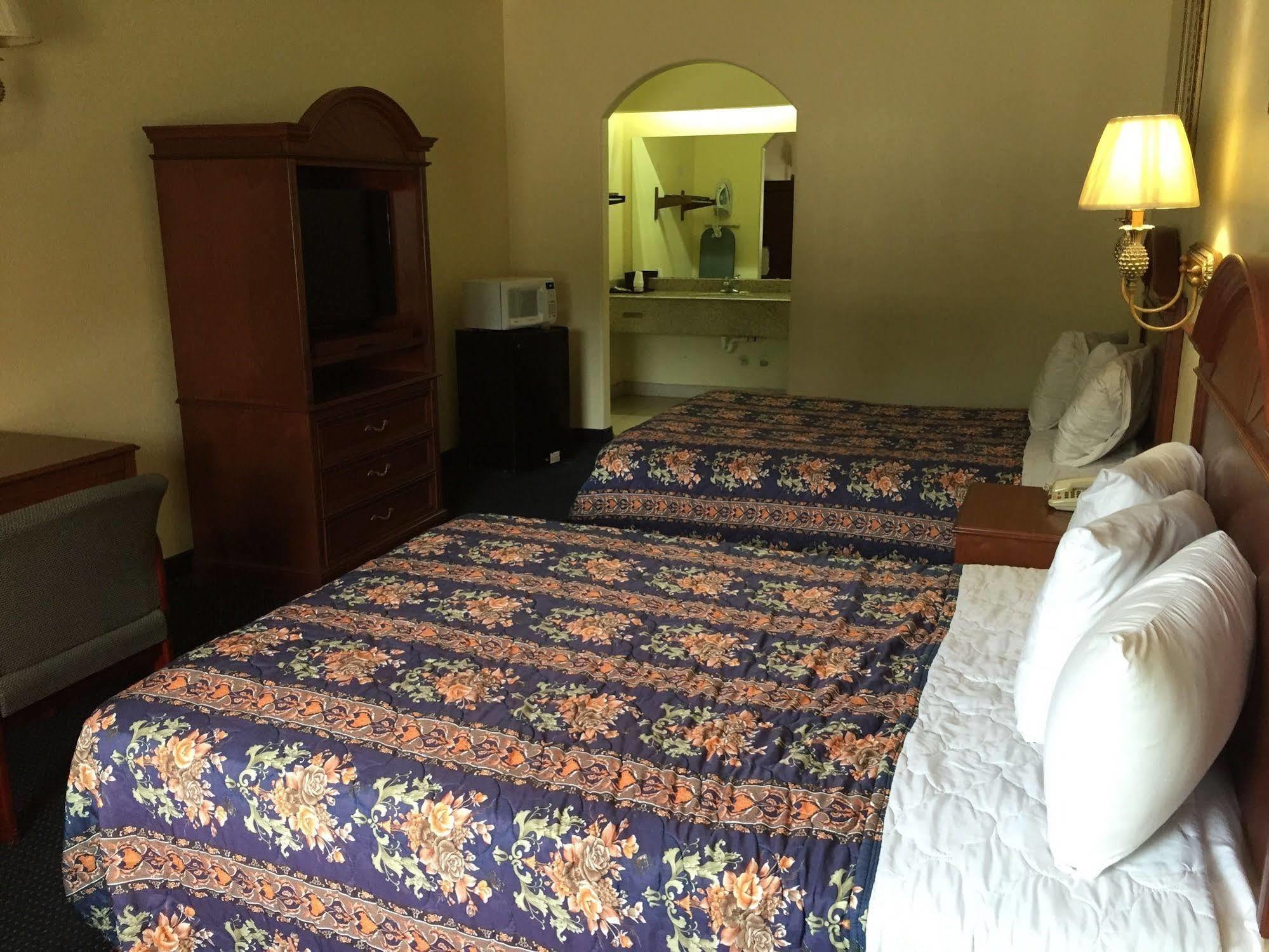 Executive Inn & Suites Shepherd 外观 照片